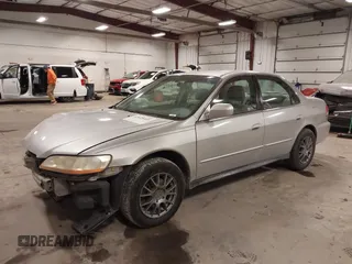 2001 Honda Accord LX z VIN 1HGCG16491A012217, wystawiony jako IAAI lot #41428403 z przebiegiem 165 268 mil mil oraz . Historia ofert i sprzedaży dostępna na DreamBid. Obrazek 2.
