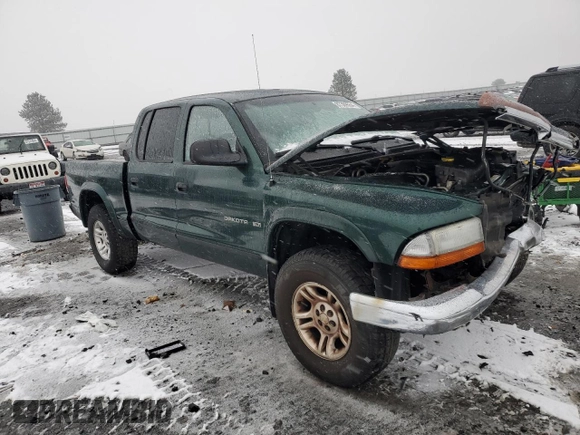 2002 Dodge Dakota SLT с VIN 1B7HG48N12S614309, выставлен на аукционе Copart как лот 87309554 с пробегом 287 994 миль миль и Списание • Salvage title. История ставок и продаж доступна на DreamBid. Изображение 4.