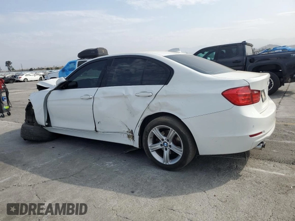 2015 BMW 3 Series 328i with VIN WBA3A5C56FF606517, listed as a Copart auction lot 59388115 with 185,684 mi miles and Salvage title. Bid and sale history available at DreamBid. Image 2.