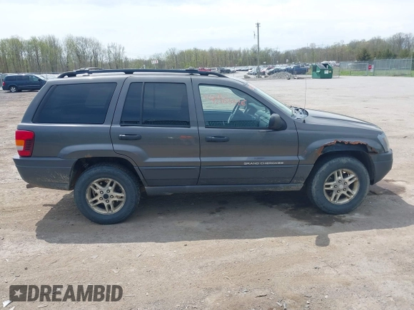 2004 Jeep Grand Cherokee Laredo z VIN 1J4GW48S34C399804, wystawiony jako IAAI lot #42163326 z przebiegiem 203 278 mil mil oraz . Historia ofert i sprzedaży dostępna na DreamBid. Obrazek 13.