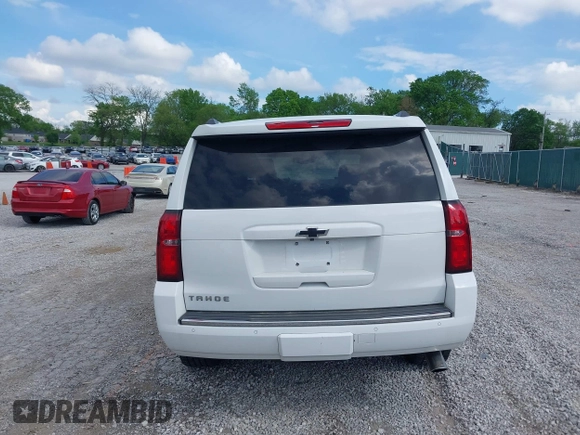 2016 Chevrolet Tahoe LTZ z VIN 1GNSKCKC7GR243183, wystawiony jako IAAI lot #41939209 z przebiegiem 81 903 mil mil oraz . Historia ofert i sprzedaży dostępna na DreamBid. Obrazek 16.