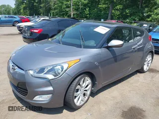 2013 Hyundai Veloster w/Gray Int with VIN KMHTC6AD5DU132237, listed as a IAAI auction lot 42268005 with 84,646 mi miles and . Bid and sale history available at DreamBid. Image 2.