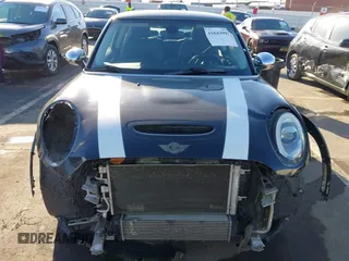 2014 MINI Hardtop S z VIN WMWXM7C59ET970371, wystawiony jako IAAI lot #41643992 z przebiegiem 123 813 mil mil oraz . Historia ofert i sprzedaży dostępna na DreamBid. Obrazek 6.