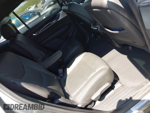 2022 Cadillac XT6 Premium Luxury z VIN 1GYKPDRS4NZ146284, wystawiony jako IAAI lot #42150678 z przebiegiem 28 890 mil mil oraz . Historia ofert i sprzedaży dostępna na DreamBid. Obrazek 8.