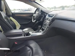 2012 Cadillac CTS with VIN 1G6DC5E52C0116219, listed as a IAAI auction lot 42463440 with 190,818 mi miles and . Bid and sale history available at DreamBid. Image 5.