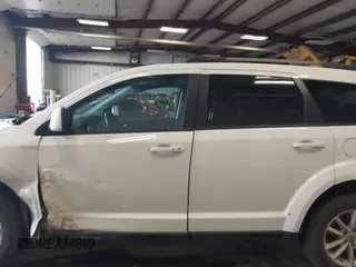 2018 Dodge Journey SXT with VIN 3C4PDDBGXJT469945, listed as a IAAI auction lot 42266310 with 121,871 mi miles and . Bid and sale history available at DreamBid. Image 14.