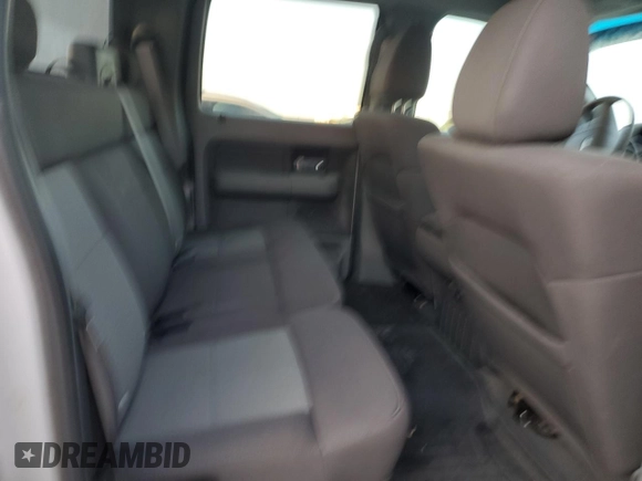 2006 Ford F-150 XLT with VIN 1FTRW12W36KC59835, listed as a Copart auction lot 52481585 with 201,301 mi miles and Salvage Title. Bid and sale history available at DreamBid. Image 10.