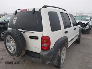 2004 Jeep Liberty Sport with VIN 1J4GK48K54W201010, listed as a IAAI auction lot 41864614 with 214,725 mi miles and . Bid and sale history available at DreamBid. Image 4.