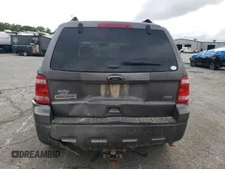 2012 Ford Escape XLT с VIN 1FMCU9DGXCKB34077, выставлен на аукционе Copart как лот 71502944 с пробегом 297 902 миль миль и Списание • Salvage title. История ставок и продаж доступна на DreamBid. Изображение 6.