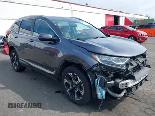 2017 Honda CR-V Touring with VIN 2HKRW2H95HH646184, listed as a IAAI auction lot 41906341 with 58,529 mi miles. Bid and sale history available at carsss.com. Image 1.