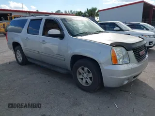 2013 GMC Yukon XL SLT with VIN 1GKS1KE01DR311582, listed as a IAAI auction lot 41646991 with 164,789 mi miles. Bid and sale history available at carsss.com. Image 1.