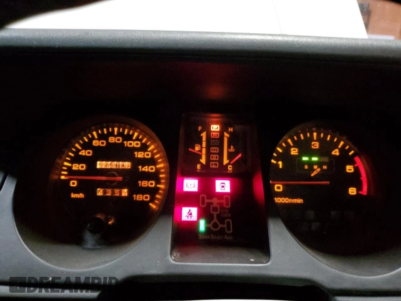 1995 Mitsubishi Montero z VIN 2BGF0126264046653, wystawiony jako Copart lot #81135584 z przebiegiem 254 106 mil mil oraz Czysty tytuł • Clean title. Historia ofert i sprzedaży dostępna na DreamBid. Obrazek 9.