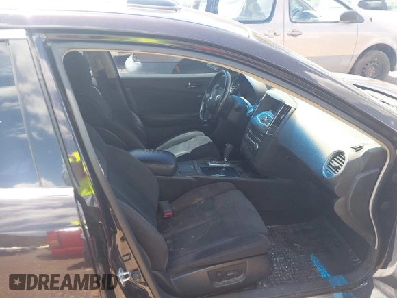 2013 Nissan Maxima S with VIN 1N4AA5AP7DC837414, listed as a IAAI auction lot 42140089 with 123,328 mi miles and . Bid and sale history available at DreamBid. Image 5.