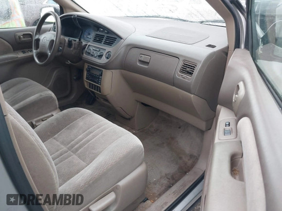 2002 Toyota Sienna CE with VIN 4T3ZF19C02U493816, listed as a IAAI auction lot 41813141 with 216,915 mi miles. Bid and sale history available at carsss.com. Image 5.