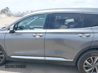2019 Hyundai Santa Fe Limited z VIN 5NMS53AD2KH088517, wystawiony jako IAAI lot #42226900 z przebiegiem 73 672 mil mil oraz . Historia ofert i sprzedaży dostępna na DreamBid. Obrazek 15.