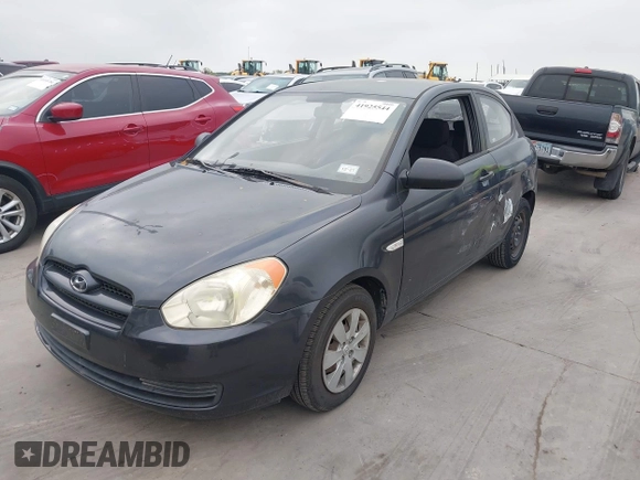 2007 Hyundai Accent GS with VIN KMHCM36C07U003757, listed as a IAAI auction lot 41925544 with 89,882 mi miles. Bid and sale history available at carsss.com. Image 2.