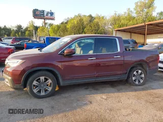 2017 Honda Ridgeline RTL-E with VIN 5FPYK3F74HB029959, listed as a IAAI auction lot 40530840 with 95,596 mi miles and . Bid and sale history available at DreamBid. Image 14.