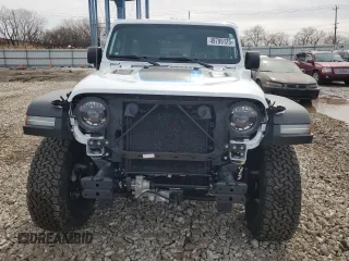 2023 Jeep Wrangler Rubicon z VIN 1C4JJXR6XPW663181, wystawiony jako Copart lot #49799125 z przebiegiem 8 085 mil mil oraz Szkoda całkowita • Salvage title. Historia ofert i sprzedaży dostępna na DreamBid. Obrazek 5.