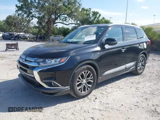 2016 Mitsubishi Outlander GT with VIN JA4JZ4AX0GZ017846, listed as a IAAI auction lot 41900962 with 117,604 mi miles and . Bid and sale history available at DreamBid. Image 2.