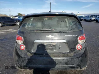 2012 Chevrolet Sonic LTZ z VIN 1G1JE6SH2C4126197, wystawiony jako Copart lot #85541214 z przebiegiem Nie podano mil oraz Szkoda całkowita • Salvage title. Historia ofert i sprzedaży dostępna na DreamBid. Obrazek 6.