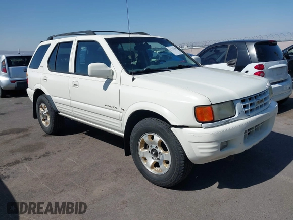 1999 Isuzu Rodeo S with VIN 4S2CK58W7X4325703, listed as a IAAI auction lot 42715480 with 205,420 mi miles and . Bid and sale history available at DreamBid. Image 6.