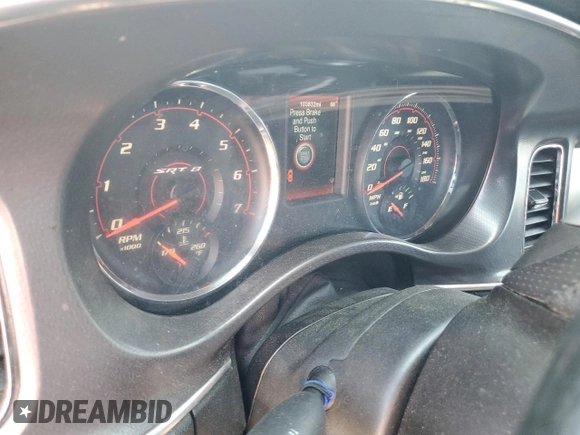 2014 Dodge Charger SRT8 Super Bee with VIN 2C3CDXGJ6EH309830, listed as a Copart auction lot 71067954 with 103,832 mi miles and Salvage Title. Bid and sale history available at carsss.com. Image 9.