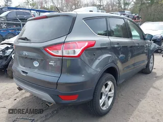 2015 Ford Escape SE with VIN 1FMCU9GX5FUC52980, listed as a IAAI auction lot 42106795 with Not Provided miles and . Bid and sale history available at DreamBid. Image 4.