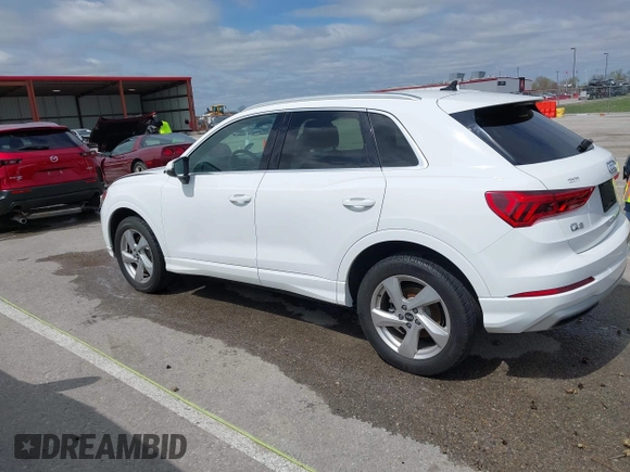 2021 Audi Q3 Premium with VIN WA1AUCF33M1096437, listed as a IAAI auction lot 41910411 with 86,837 mi miles and . Bid and sale history available at DreamBid. Image 15.