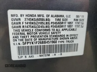 2011 Honda Ridgeline RT z VIN 5FPYK1F26BB451960, wystawiony jako Copart lot #53733215 z przebiegiem 202 556 mil mil oraz Szkody całkowita. Historia ofert i sprzedaży dostępna na DreamBid. Obrazek 13.