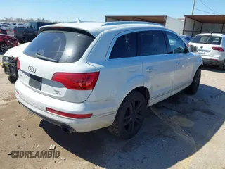 2014 Audi Q7 3.0T Premium Plus with VIN WA1LGAFEXED000843, listed as a IAAI auction lot 41728585 with 169,033 mi miles. Bid and sale history available at carsss.com. Image 4.