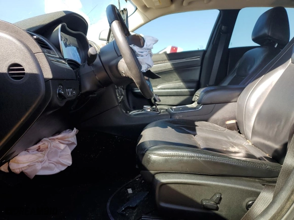 2015 Chrysler 300 Limited with VIN 2C3CCAAG9FH931000, listed as a Copart auction lot 46718525 with 141,930 mi miles and Salvage Title. Bid and sale history available at carsss.com. Image 7.