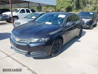 2014 Chevrolet Impala LS with VIN 2G11Y5SL3E9209885, listed as a IAAI auction lot 40714570 with 131,544 mi miles. Bid and sale history available at carsss.com. Image 2.