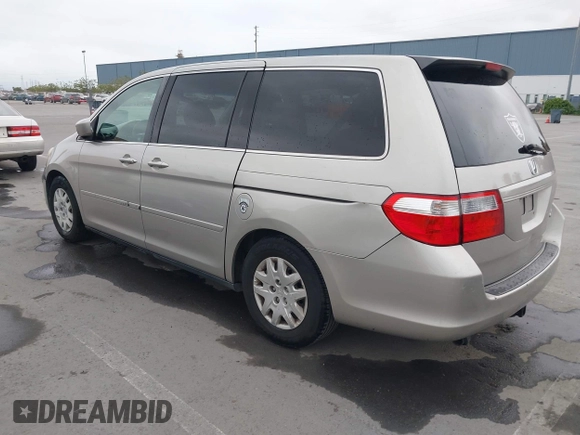 2005 Honda Odyssey LX with VIN 5FNRL38205B026824, listed as a IAAI auction lot 42068656 with 140,914 mi miles. Bid and sale history available at carsss.com. Image 3.