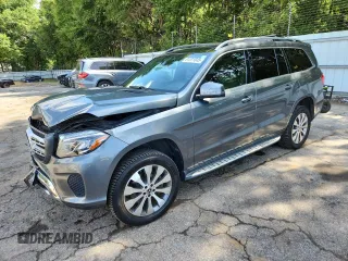 2018 Mercedes-Benz GLS 450 с VIN 4JGDF6EE5JB082414, выставлен на аукционе Copart как лот 61671045 с пробегом 112 592 миль миль и Списание • Salvage title. История ставок и продаж доступна на DreamBid. Изображение 1.