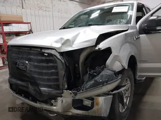 2015 Ford F-150 XLT z VIN 1FTEX1EP7FKE12930, wystawiony jako IAAI lot #42321898 z przebiegiem 59 012 mil mil oraz . Historia ofert i sprzedaży dostępna na DreamBid. Obrazek 6.