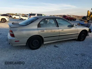 1994 Honda Accord LX with VIN 1HGCD5639RA165828, listed as a Copart auction lot 82673164 with 128,672 mi miles and Salvage Title. Bid and sale history available at carsss.com. Image 3.
