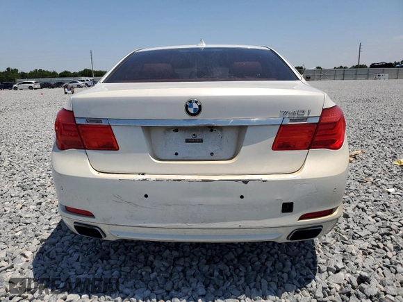 2012 BMW 7 Series 740i with VIN WBAKA4C59CDS99079, listed as a Copart auction lot 53299695 with 142,692 mi miles and Clean Title. Bid and sale history available at carsss.com. Image 6.