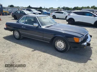 1988 Mercedes-Benz 560 SL z VIN WDBBA48D3JA079534, wystawiony jako Copart lot #58096985 z przebiegiem 83 732 mil mil oraz Tytuł czysty. Historia ofert i sprzedaży dostępna na DreamBid. Obrazek 4.