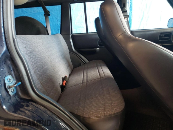 2001 Jeep Cherokee Sport with VIN 1J4FF48S81L620370, listed as a Copart auction lot 61663745 with 158,512 mi miles and Clean title. Bid and sale history available at DreamBid. Image 11.