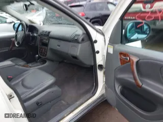 1999 Mercedes-Benz M-Class with VIN 4JGAB54E3XA141663, listed as a IAAI auction lot 41886982 with 196,503 mi miles. Bid and sale history available at carsss.com. Image 5.