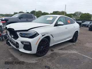 2021 BMW X6 xDrive40i z VIN 5UXCY6C00M9F88215, wystawiony jako IAAI lot #41646498 z przebiegiem 43 587 mil mil oraz . Historia ofert i sprzedaży dostępna na DreamBid. Obrazek 17.