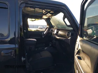 2020 Jeep Wrangler Unlimited Sport S с VIN 1C4HJXDNXLW348677, выставлен на аукционе IAAI как лот 42056986 с пробегом Не указан миль и . История ставок и продаж доступна на DreamBid. Изображение 5.