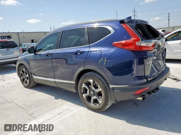 2018 Honda CR-V Touring with VIN 7FARW1H91JE026094, listed as a Copart auction lot 59942445 with 150,329 mi miles and Salvage title. Bid and sale history available at DreamBid. Image 2.