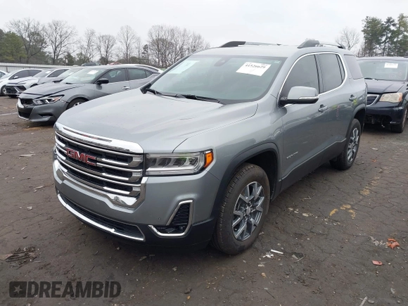 2023 GMC Acadia SLT with VIN 1GKKNML48PZ156202, listed as a IAAI auction lot 41526629 with 29,460 mi miles and . Bid and sale history available at DreamBid. Image 2.