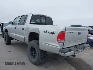2004 Dodge Dakota Sport with VIN 1D7HG38NX4S608298, listed as a IAAI auction lot 41621473 with 192,876 mi miles. Bid and sale history available at carsss.com. Image 3.