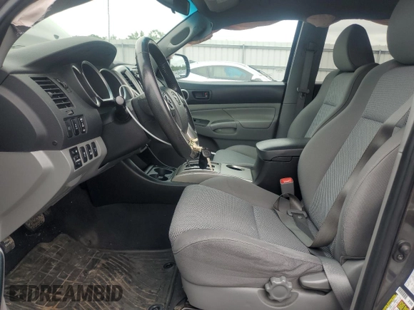 2015 Toyota Tacoma with VIN 3TMLU4EN6FM203591, listed as a Copart auction lot 58518185 with 149,729 mi miles and Salvage title. Bid and sale history available at DreamBid. Image 7.