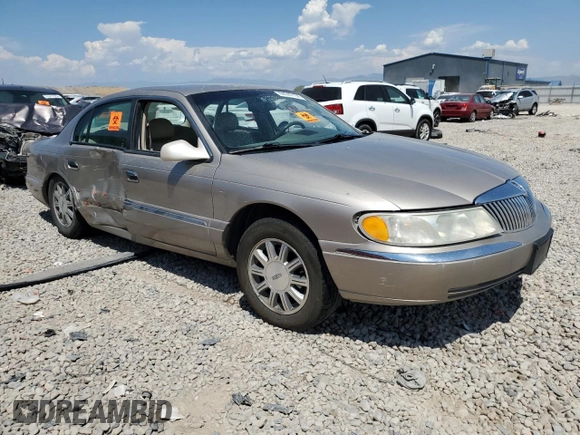 2001 Lincoln Continental z VIN 1LNHM97V21Y698784, wystawiony jako Copart lot #64040134 z przebiegiem Nie podano mil oraz Szkoda całkowita • Salvage title. Historia ofert i sprzedaży dostępna na DreamBid. Obrazek 4.