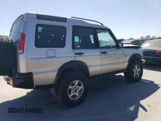 2000 Land Rover Discovery Cloth z VIN SALTY1242YA252357, wystawiony jako Copart lot #76602914 z przebiegiem 107 927 mil mil oraz Szkoda całkowita • Salvage title. Historia ofert i sprzedaży dostępna na DreamBid. Obrazek 3.