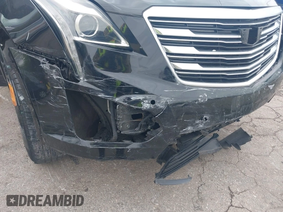 2017 Cadillac XT5 Luxury AWD with VIN 1GYKNDRS7HZ157936, listed as a IAAI auction lot 41971116 with 134,351 mi miles and . Bid and sale history available at DreamBid. Image 6.