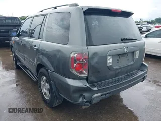 2008 Honda Pilot EX-L with VIN 5FNYF28548B007852, listed as a IAAI auction lot 42387060 with 261,023 mi miles and . Bid and sale history available at DreamBid. Image 3.